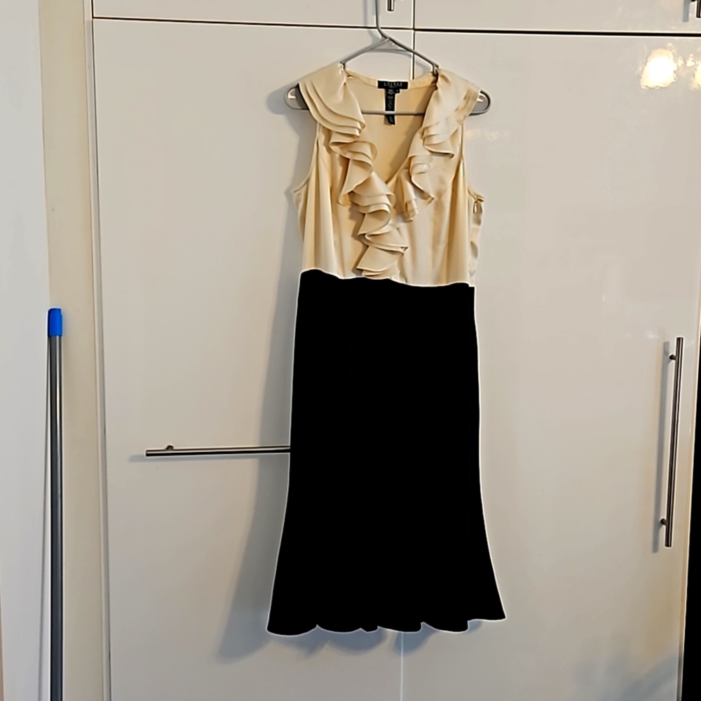 Ralpf Lauren evening dress with pure silk top. Gorgeous fringes. Size 12.